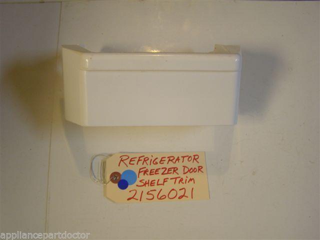 REFRIGERATOR 2156021 FREEZER DOOR SHELF TRIM USED REFRIGERATOR 2156021 FREEZER DOOR SHELF TRIM USED